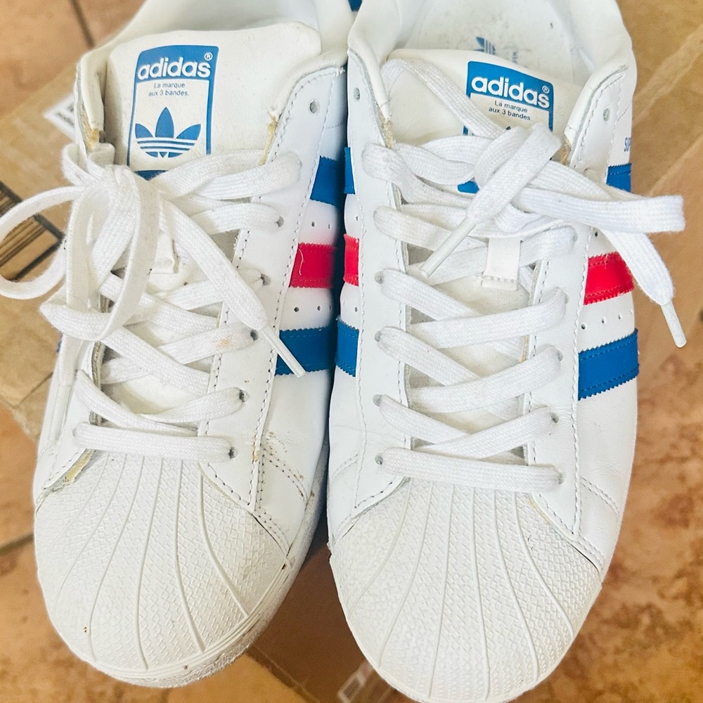 Adidas White Sneakers with Blue and Red Accents